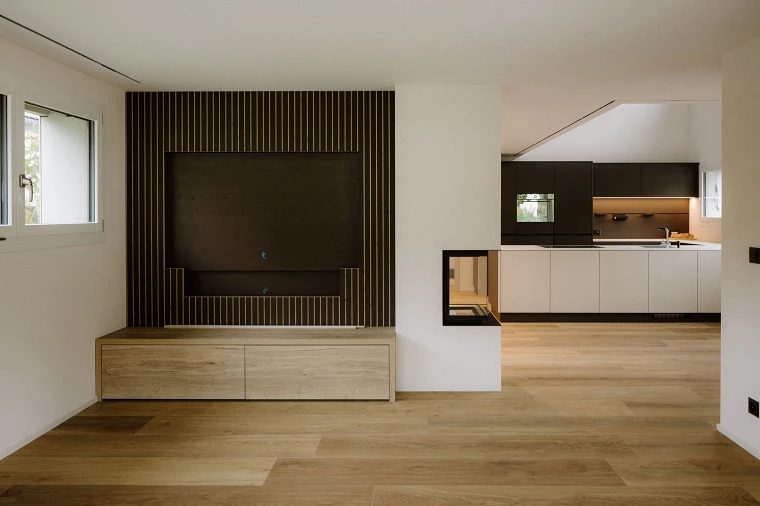 Wohnzimmer und Küche; Künzi + Knutti AG, Bild: Anja Zurbrügg Photography