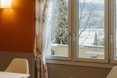 Rundbogenfenster Altbau; Loosli+Partner AG, L2A Architekten AG, Bild: Anja Zurbrügg Photography